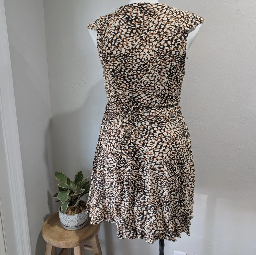 Free People French Quarter Mini Wrap dress cheetah print‎ size L